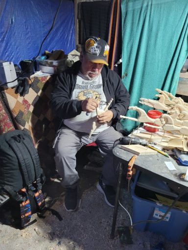 Alvin creating Spirit Horses in his workroom and warmed by his grandmother's 100-year-old woodstove.